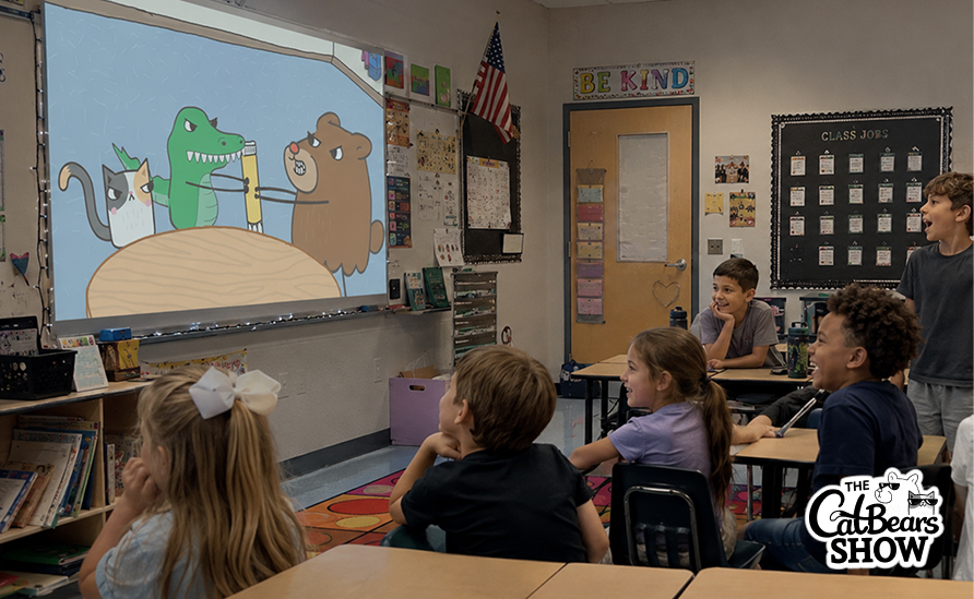 The Catbears Show on screen in a classroom while the teacher leads the discussion